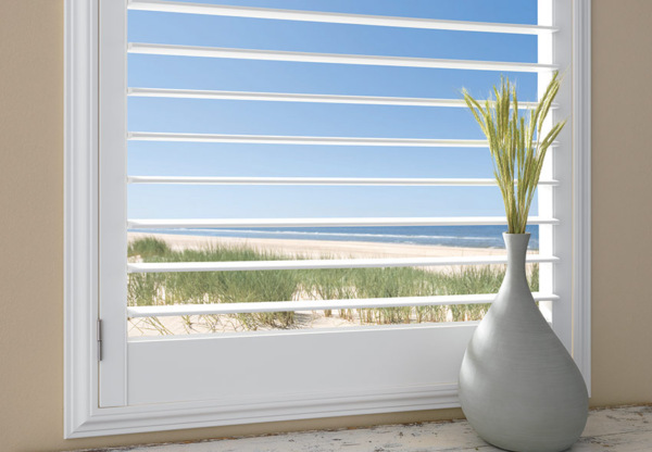 plantation shutters with a 3.5 inch louver by ashade above window fashions