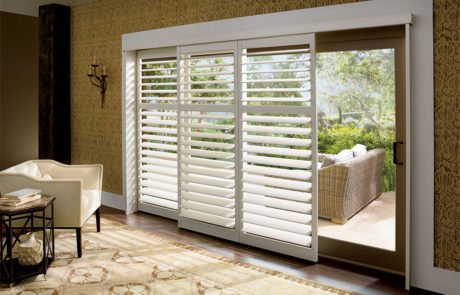plantation shutters for sliding glass doors open bypass track by a shade above window fashions