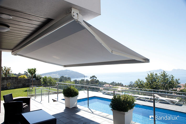 retractable awnings by a shade above window fashions